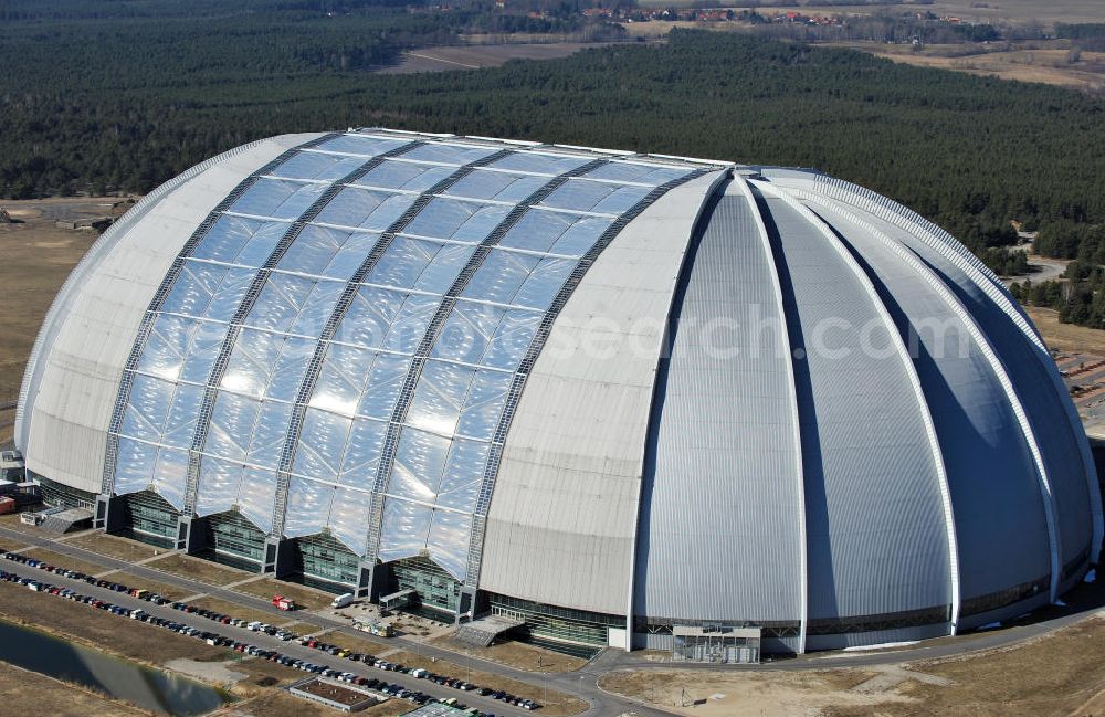 Halbe from above - Die ehemalige Cargolifterhalle und größte freitragende Halle (Aerium) der Welt auf dem Gelände des ehemaligen Militärflugplatzes in Halbe-Brand. Heute befindet sich in der Halle das Tropical Islands, die größte tropische Freizeitwelt Europas. The former Cargolift Hall on the area of the former military airport in Halbe-Brand.