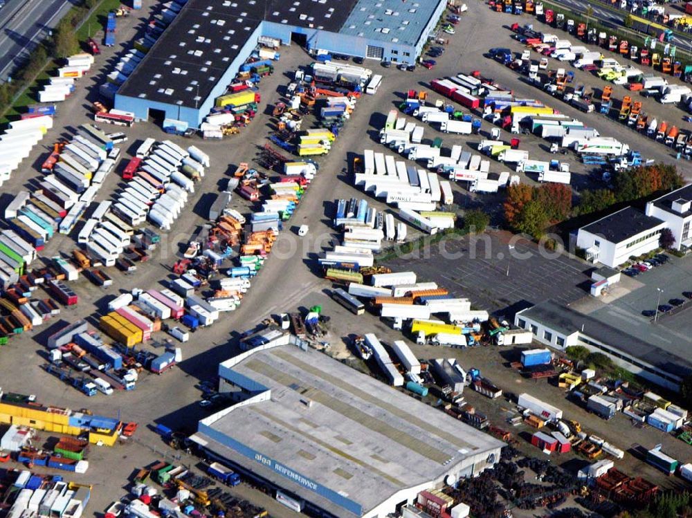 Aerial image Sittensen - 18.10.2005 Sittensen; Die Firma Alga betreibt seit über 30 Jahren in Sittensen an der A1 einen Nutzfahrzeughandel, auf ca. 400.000 m² Lagerfläche werden mehr als 3000 Einheiten vorgehalten. Ergänzt wird die Angebotspalette durch einen Reifengroßhandel und Service, durch Werkstatt, Lackiererei und Ersatzteillager.