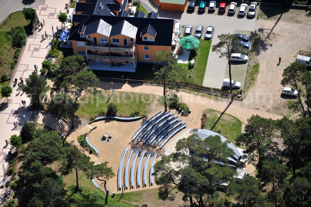 Aerial photograph Trassenheide - View at the stage Kurmuschel in the colony of the sea resort Trassenheide. Beside is the Haus zur Düne with its apartments that are partially hired for holiday