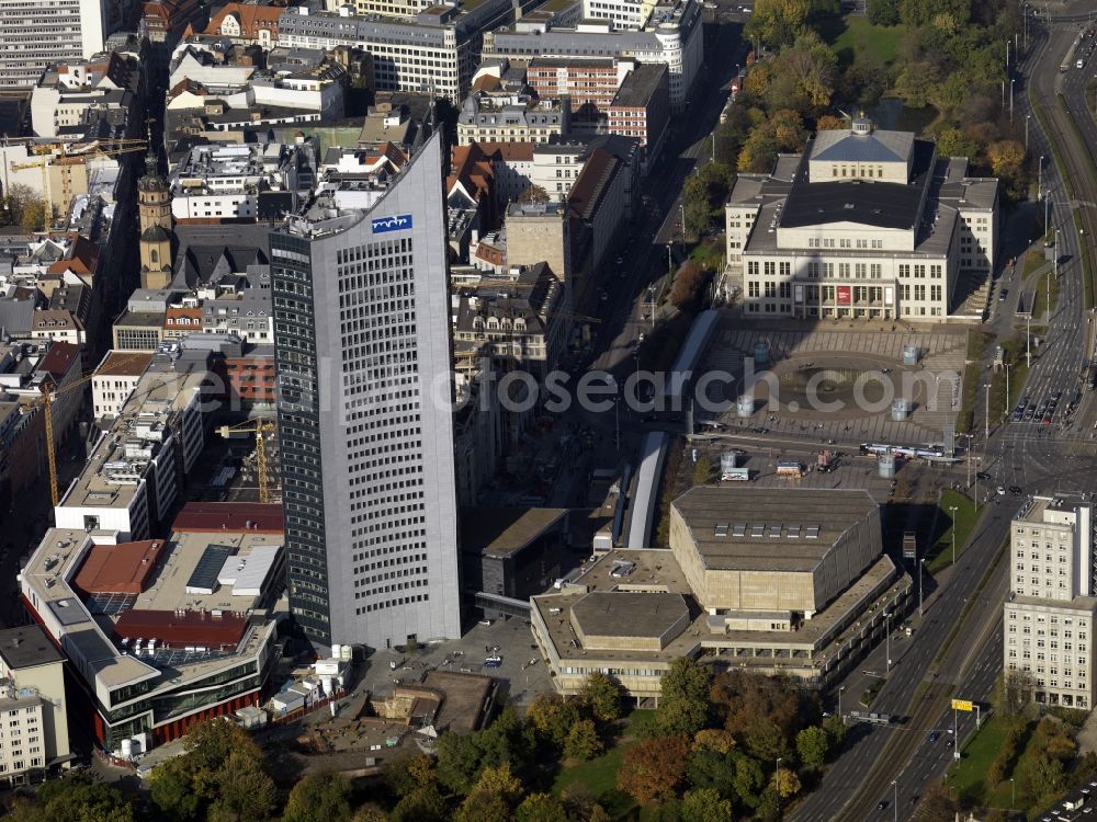 Aerial photograph Leipzig - Overview of the buildings on Augustusplatz in the city of Leipzig in the state of Saxony. The new main building of the University of Leipzig, the high rise of the MDR and the Augustus Platz with the Gewandhaus and the Opera House. Next to the MDR tower, a new building is created for the campus of the University