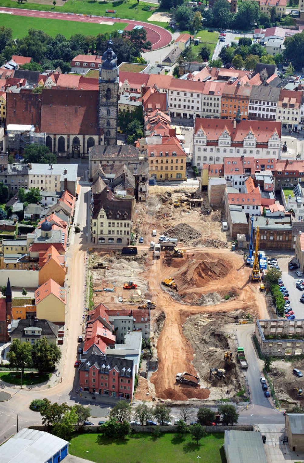 Wittenberg from above - View of the construction site of the shopping center Arsenal between the Arsenal square and the market place in the inner city of Wittenberg. Project developers are MIB AG and the OFB Development GmbH. The completion is scheduled for autumn 2012