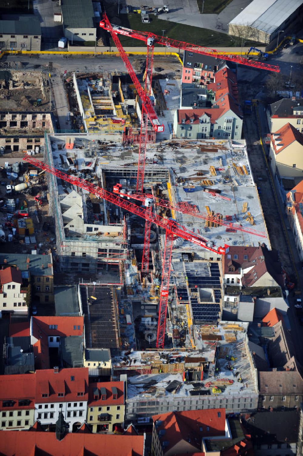 Wittenberg from above - View of the construction site of the shopping center Arsenal between the Arsenal square and the market place in the inner city of Wittenberg. Project developers are MIB AG and the OFB Development GmbH. The completion is scheduled for autumn 2012