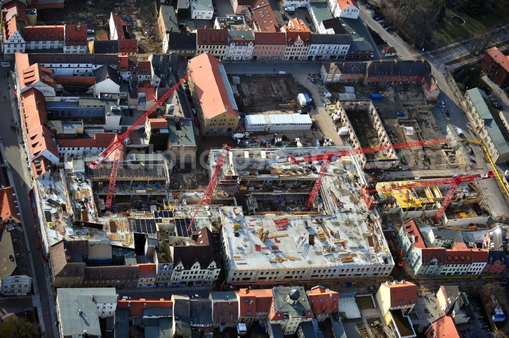 Wittenberg from the bird's eye view: View of the construction site of the shopping center Arsenal between the Arsenal square and the market place in the inner city of Wittenberg. Project developers are MIB AG and the OFB Development GmbH. The completion is scheduled for autumn 2012