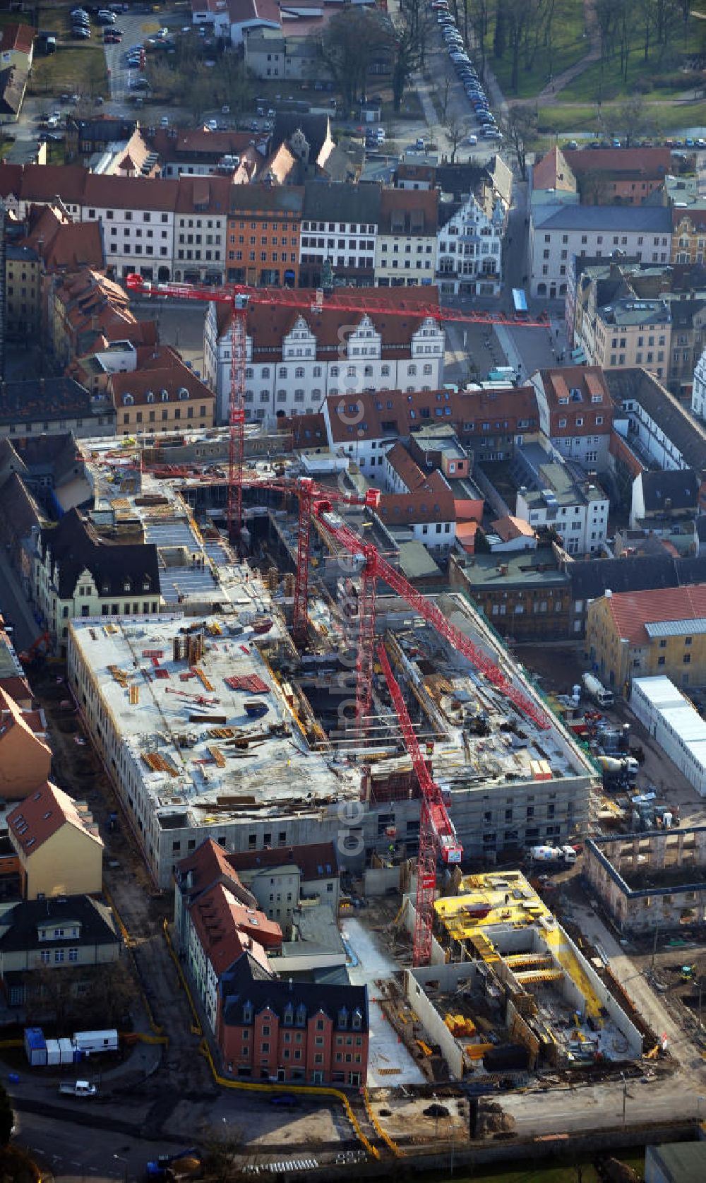 Aerial image Wittenberg - View of the construction site of the shopping center Arsenal between the Arsenal square and the market place in the inner city of Wittenberg. Project developers are MIB AG and the OFB Development GmbH. The completion is scheduled for autumn 2012