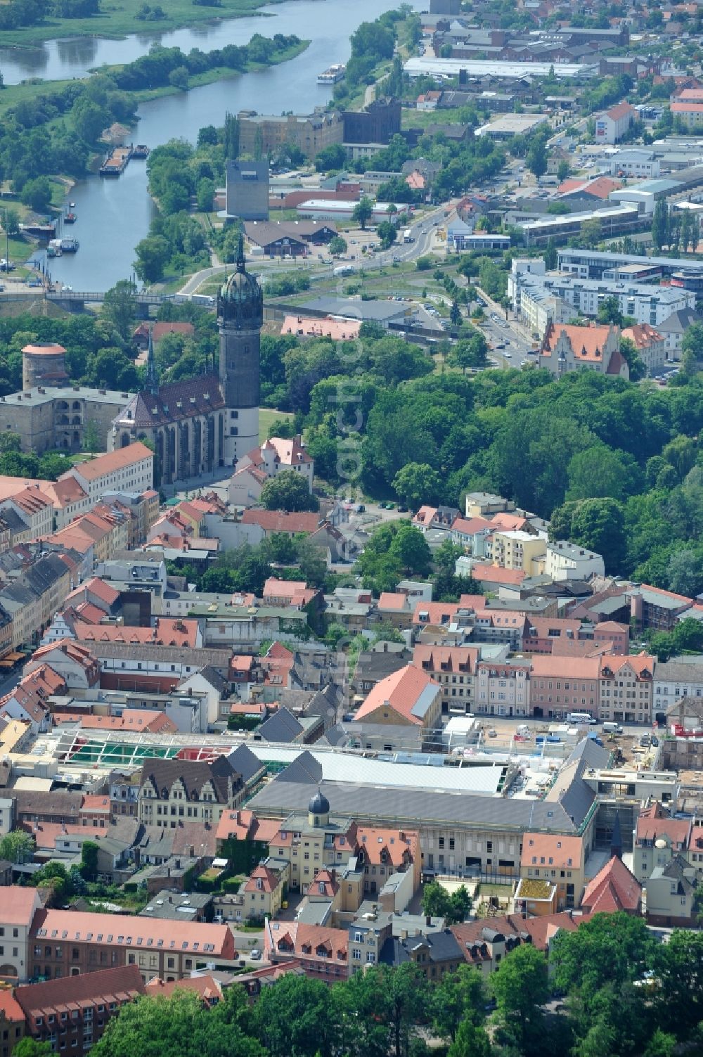 Wittenberg from above - View of the construction site of the shopping center Arsenal between the Arsenal square and the market place in the inner city of Wittenberg. Project developers are MIB AG and the OFB Development GmbH. The completion is scheduled for autumn 2012