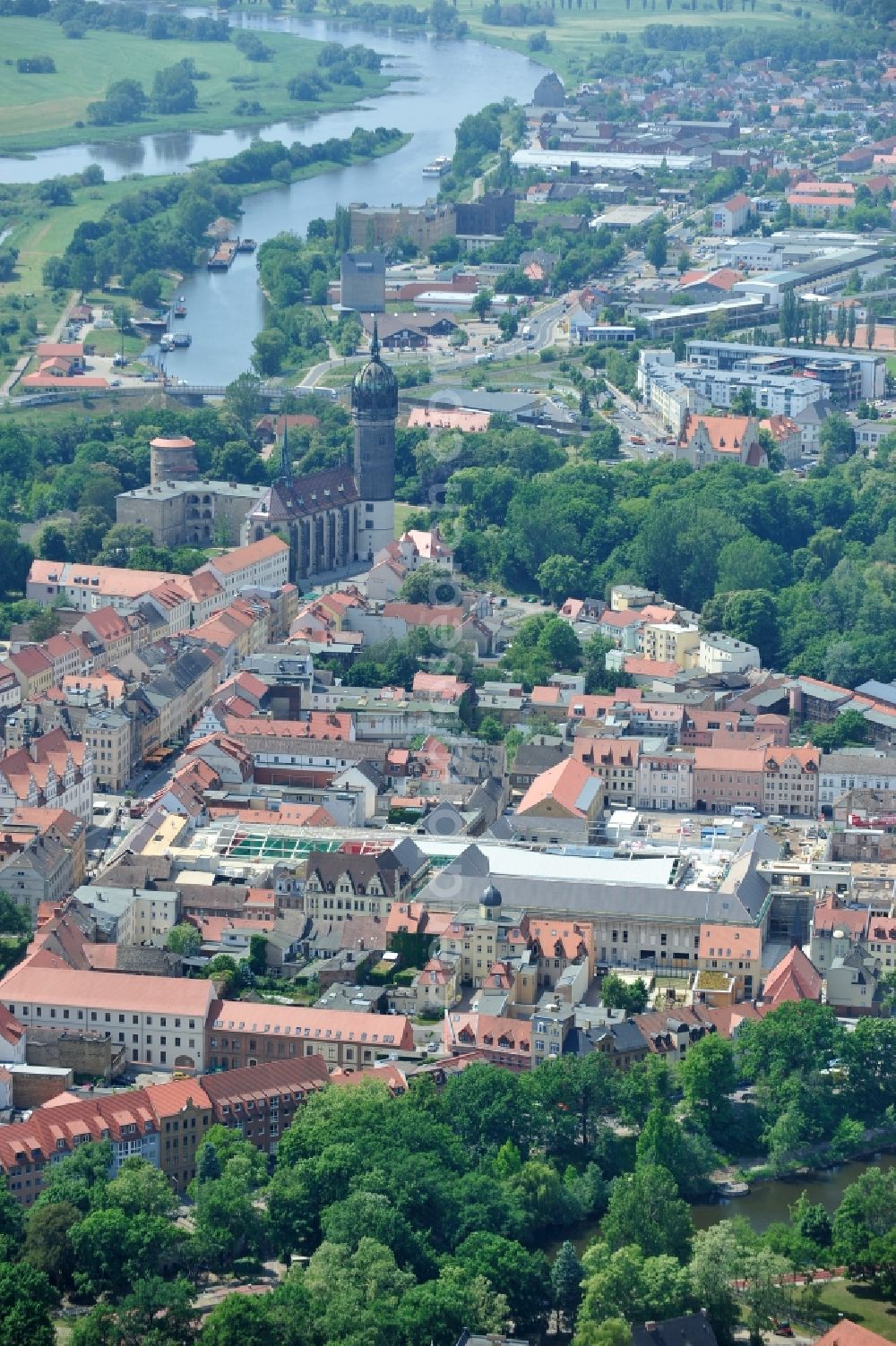 Wittenberg from the bird's eye view: View of the construction site of the shopping center Arsenal between the Arsenal square and the market place in the inner city of Wittenberg. Project developers are MIB AG and the OFB Development GmbH. The completion is scheduled for autumn 2012