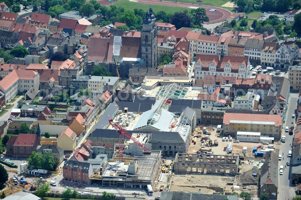 Aerial image Wittenberg - View of the construction site of the shopping center Arsenal between the Arsenal square and the market place in the inner city of Wittenberg. Project developers are MIB AG and the OFB Development GmbH. The completion is scheduled for autumn 2012