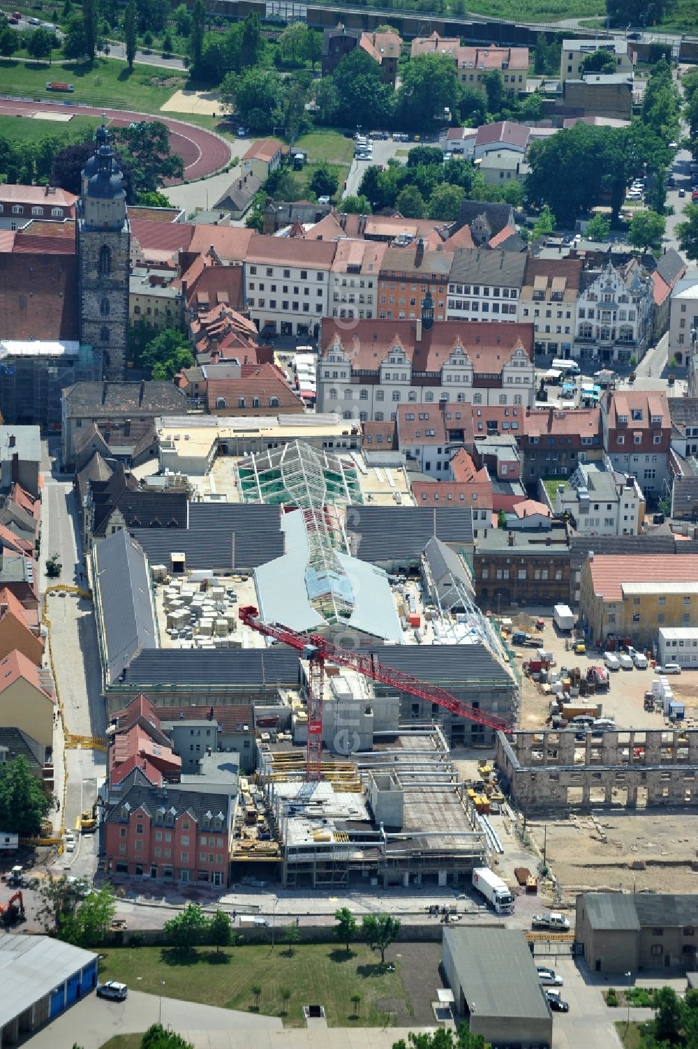 Wittenberg from above - View of the construction site of the shopping center Arsenal between the Arsenal square and the market place in the inner city of Wittenberg. Project developers are MIB AG and the OFB Development GmbH. The completion is scheduled for autumn 2012