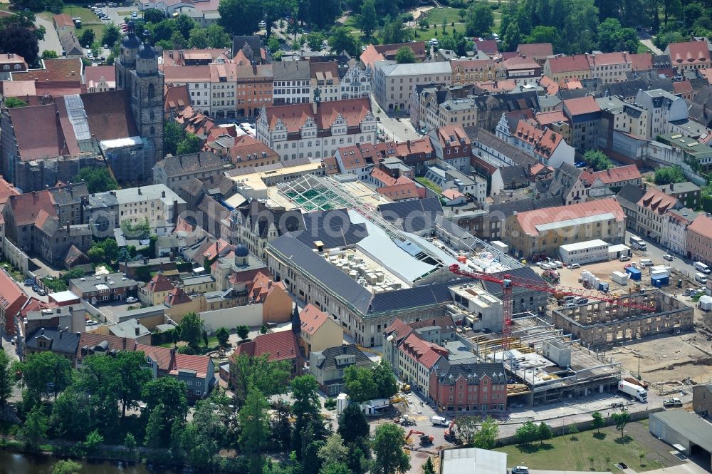 Wittenberg from the bird's eye view: View of the construction site of the shopping center Arsenal between the Arsenal square and the market place in the inner city of Wittenberg. Project developers are MIB AG and the OFB Development GmbH. The completion is scheduled for autumn 2012