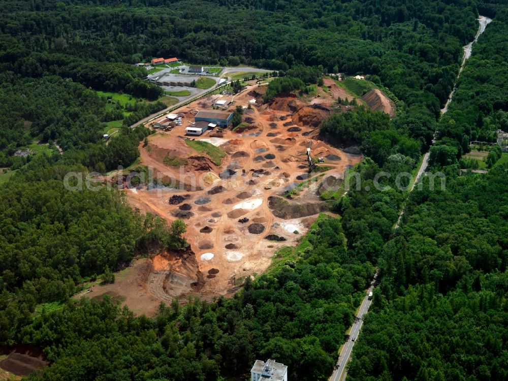 Aerial image Messel - The Messel is a disused mine. Was known by the Messel Pit and beautifully preserved fossils found there are of mammals, birds, reptiles, fish, insects and plants from the Eocene. Best known is the early equine Propalaeotherium, were found by more than 70 individuals. Other important findings are Messelornis cristata, a crane bird, about half of all be found in the Messel Pit Fossil bird belongs, and an extinct primate. The Messel Pit is the first of the three UNESCO World Natural Heritage sites in Germany