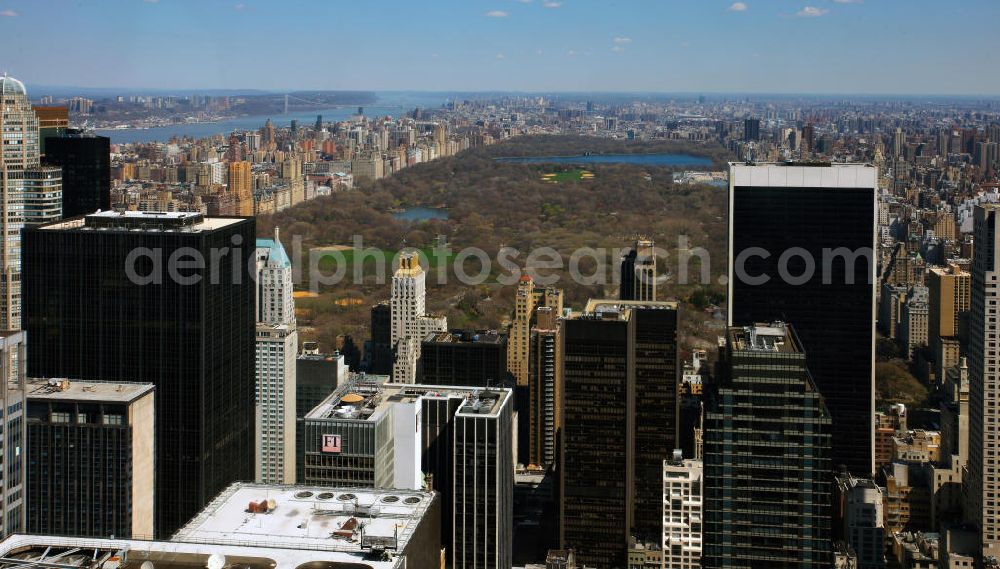 New York from the bird's eye view: View of the skyscrapers of the Midtown Center of Manhattan to New York's Central Park. This park was established in 1853 and is used ever since as a public park