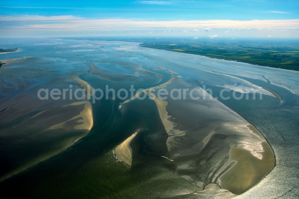 Aerial photograph Baltrum - Baltrum is a dune island off the coast of East Friesland in Lower Saxony. It is located in the middle of the seven inhabited East Frisian Islands Chain and is required both by area and by population the smallest. Parts of the island and the Wadden Sea around the island belong to the National Park Wadden Sea