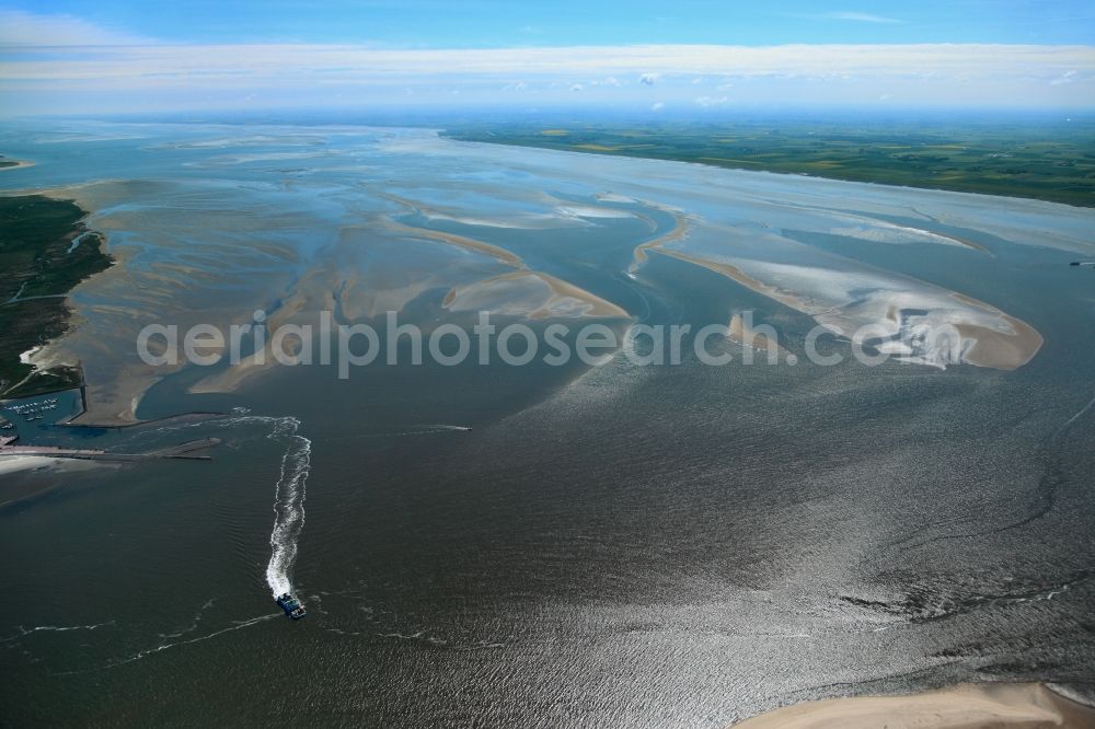 Baltrum from above - Baltrum is a dune island off the coast of East Friesland in Lower Saxony. It is located in the middle of the seven inhabited East Frisian Islands Chain and is required both by area and by population the smallest. Parts of the island and the Wadden Sea around the island belong to the National Park Wadden Sea