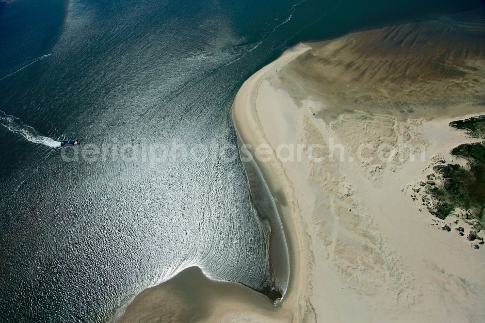 Baltrum from the bird's eye view: Baltrum is a dune island off the coast of East Friesland in Lower Saxony. It is located in the middle of the seven inhabited East Frisian Islands Chain and is required both by area and by population the smallest. Parts of the island and the Wadden Sea around the island belong to the National Park Wadden Sea