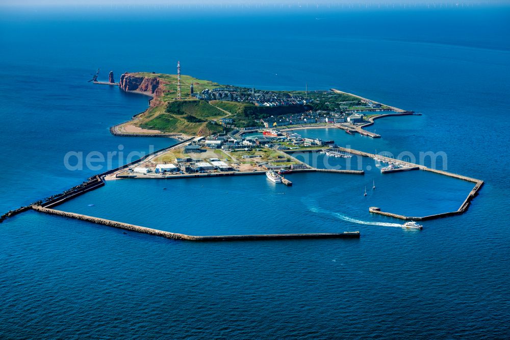 Aerial photograph Helgoland - The island of Heligoland in the North Sea with the harbor area, with the catamaran Adler Cat on the way to Sylt, on Heligoland in the federal state of Schleswig-Holstein