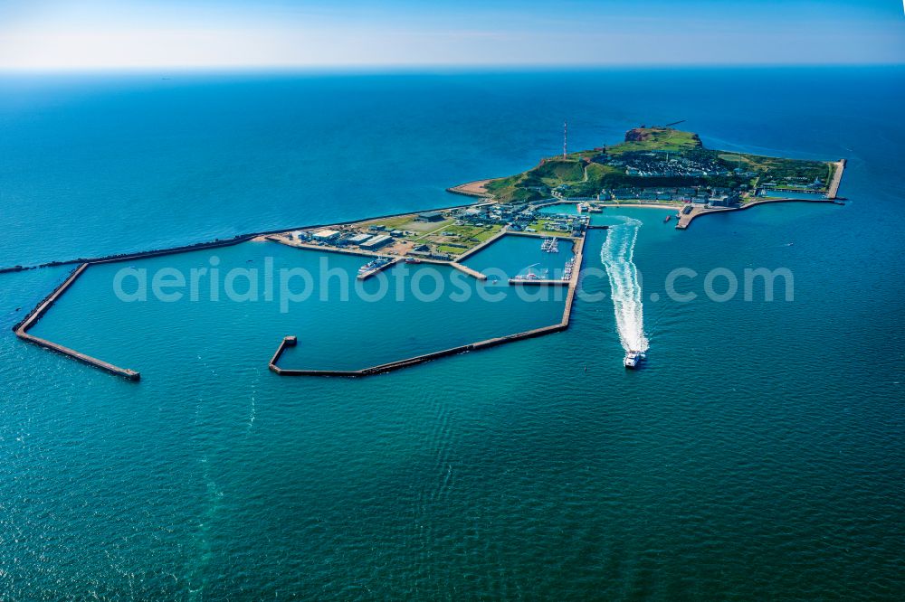 Aerial photograph Helgoland - The island of Heligoland in the North Sea with the harbor area, with the catamaran Adler Jet on the way to Sylt, on Heligoland in the federal state of Schleswig-Holstein