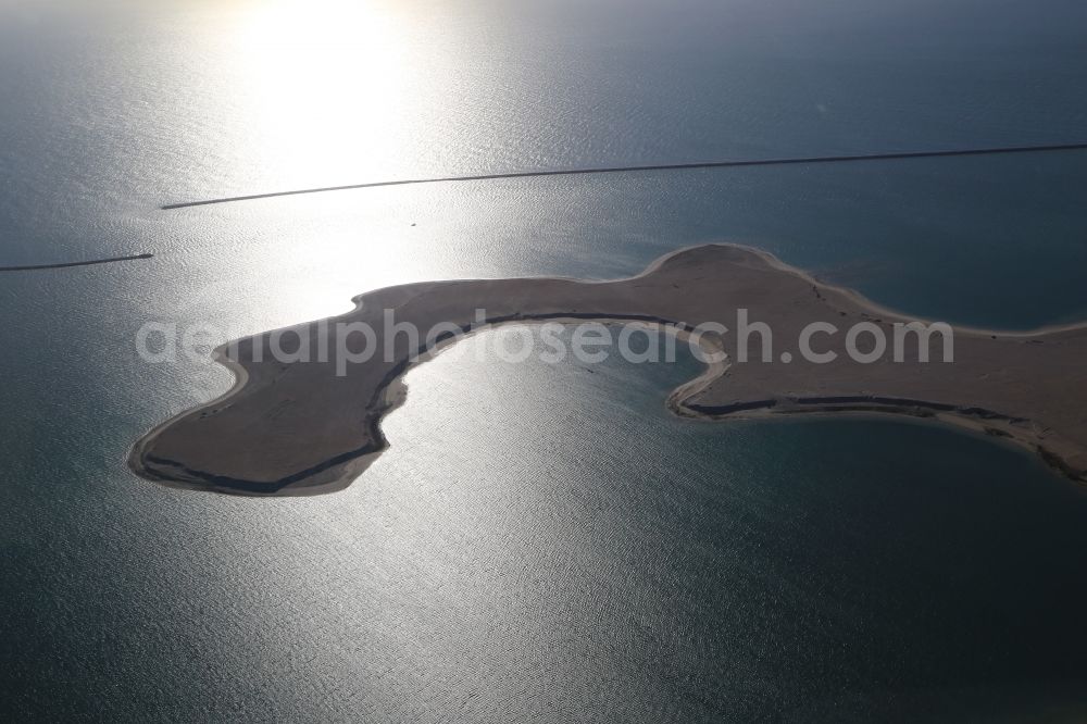 Dubai from above - The islands of The World just off the coast of Dubai in the United Arab Emirates consists of about three hundred man-made islands. The giant project threatens to become a flop. Since 2011, the construction works rest. Only two islands are completed and inhabited