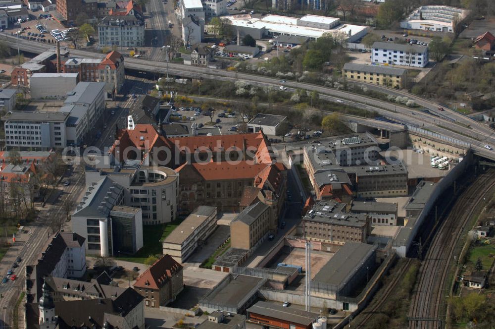 Aerial image MAGDEBURG - Blick auf die Justizvollzugsanstalt (JVA) Magdeburg und das Landgericht Magdeburg. Das Landgericht Magdeburg ist ein Gericht der ordentlichen Gerichtsbarkeit und eines von vier Landgerichten im Bezirk des Oberlandesgerichts Naumburg, dem einzigen Oberlandesgerichtsbezirk des Bundeslandes Sachsen-Anhalt. Es hat seinen Sitz in der Landeshauptstadt Magdeburg. Kontakt: Justizvollzugsanstalt Magdeburg, Halberstädter Str. 8a, 39112 Magdeburg; Postfach 18 61, 39008 Magdeburg, Tel. +49 (0)391 6 06 33 63, Fax +49 (0)391 6 06 34 09; Kontakt Landgericht Magdeburg: Halberstädter Str. 8, 39112 Magdeburg; Postfach 39 11 22, 39135 Magdeburg, Tel. +49 (0)391 606 0, Fax +49 (0)391 606 2069, e-mail: poststelle@lg-md.justiz.sachsen-anhalt.de