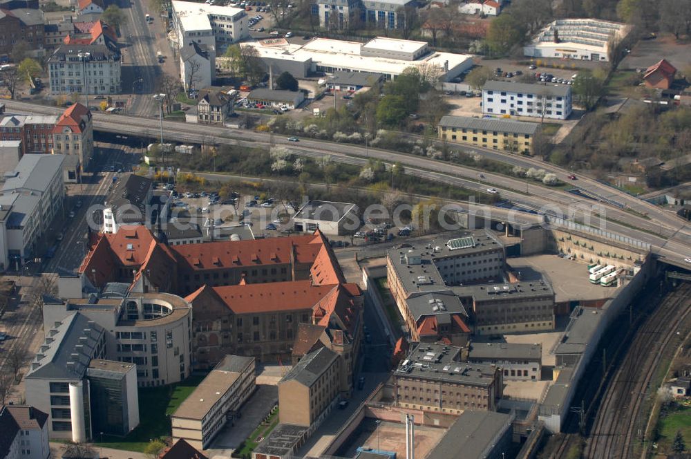 Aerial photograph MAGDEBURG - Blick auf die Justizvollzugsanstalt (JVA) Magdeburg und das Landgericht Magdeburg. Das Landgericht Magdeburg ist ein Gericht der ordentlichen Gerichtsbarkeit und eines von vier Landgerichten im Bezirk des Oberlandesgerichts Naumburg, dem einzigen Oberlandesgerichtsbezirk des Bundeslandes Sachsen-Anhalt. Es hat seinen Sitz in der Landeshauptstadt Magdeburg. Kontakt: Justizvollzugsanstalt Magdeburg, Halberstädter Str. 8a, 39112 Magdeburg; Postfach 18 61, 39008 Magdeburg, Tel. +49 (0)391 6 06 33 63, Fax +49 (0)391 6 06 34 09; Kontakt Landgericht Magdeburg: Halberstädter Str. 8, 39112 Magdeburg; Postfach 39 11 22, 39135 Magdeburg, Tel. +49 (0)391 606 0, Fax +49 (0)391 606 2069, e-mail: poststelle@lg-md.justiz.sachsen-anhalt.de