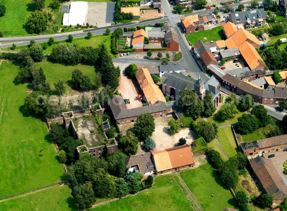 Aerial image Siersdorrf - The Catholic Church of St. John the Baptist was built in 1520. She was also the parish church and grave site and place of the residents who are knights. In Siersdorf are the ruins of the Renaissance style built in 1578 in the main house of the German Order