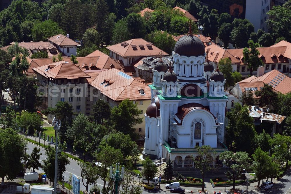 Aerial photograph Bukarest - The church of the Casin monastery in Sector 1 in Bucharest in Romania. The church has a dome and 4 towers. It is characterised by the green colour of the roofs. The Roman-orthodox church is located in a residential area on Boulevard Marasti