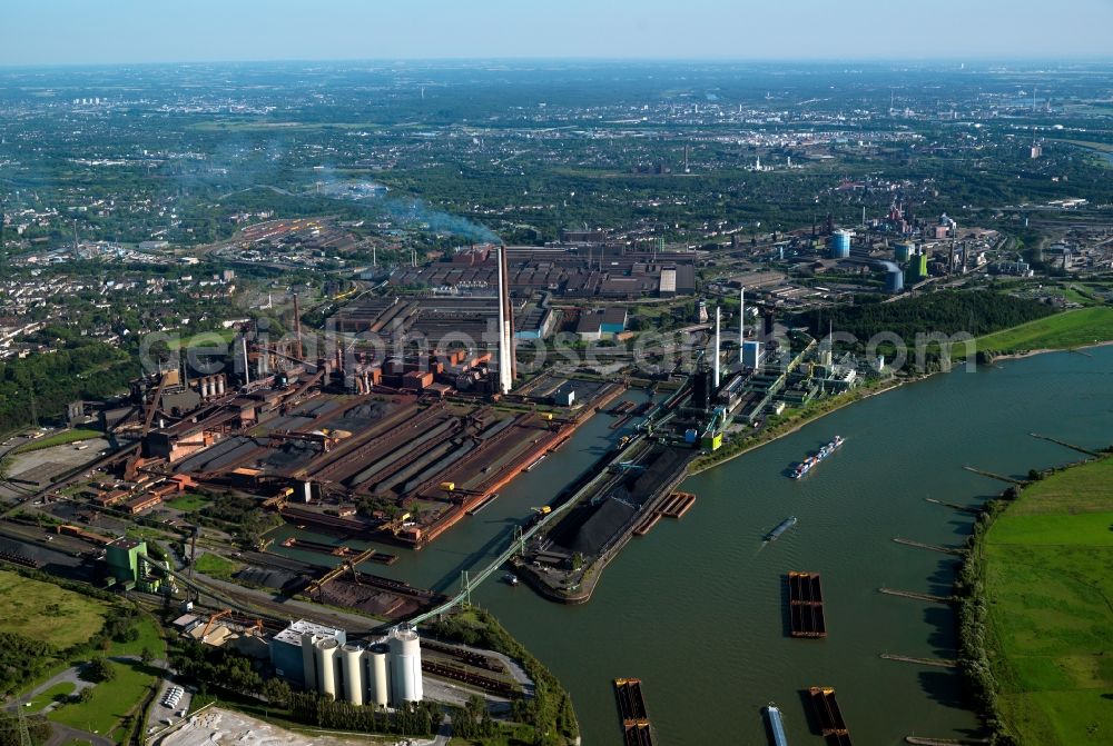 Duisburg from above - The Industrial plants in the industrial area of Schwelgern and the ThyssenKrupp steel plant in the district of Marxloh in Duisburg in North Rhine-Westphalia. The compound is located on the shores of the river Rhine and is one of the most modern coke oven plants in the world