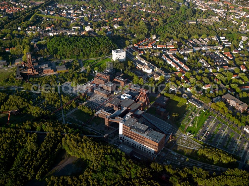 Essen from above - The coke oven plant Zollverein in Essen in the industrial area of Ruhrgebiet in the state of North Rhine-Westphalia. The site was considered as the most modern in Europe and is UNESCO world heritage site today. Due to the steel crisis, the compound was closed and is a protected building today