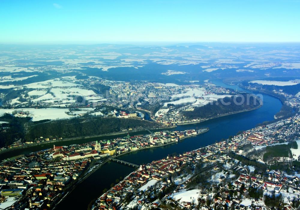 Passau from above - The university town of Passau in the state of Bavaria. Because of the junction of the rivers Ilz, Inn and Danube, Passau is also called Three Rivers Town. Visible here is the pointed peninsula, which is surrounded by the Inn to the South and the Danube to the North. It is the site of the cathedral St. Stephan. The river Ilz joins the other two by running through the Untersolden part of the town