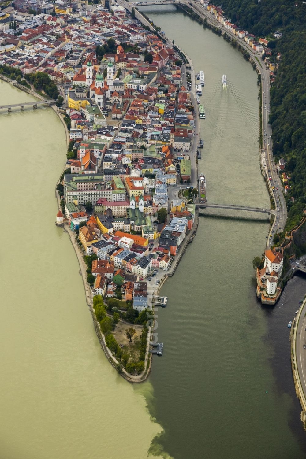 Aerial image Passau - The university town of Passau in the state of Bavaria. Because of the junction of the rivers Ilz, Inn and Danube, Passau is also called Three Rivers Town. Visible here is the pointed peninsula, which is surrounded by the Inn to the South and the Danube to the North. It is the site of the cathedral St. Stephan. The river Ilz joins the other two by running through the Untersolden part of the town