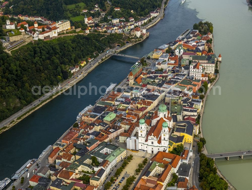 Passau from above - The university town of Passau in the state of Bavaria. Because of the junction of the rivers Ilz, Inn and Danube, Passau is also called Three Rivers Town. Visible here is the pointed peninsula, which is surrounded by the Inn to the South and the Danube to the North. It is the site of the cathedral St. Stephan. The river Ilz joins the other two by running through the Untersolden part of the town
