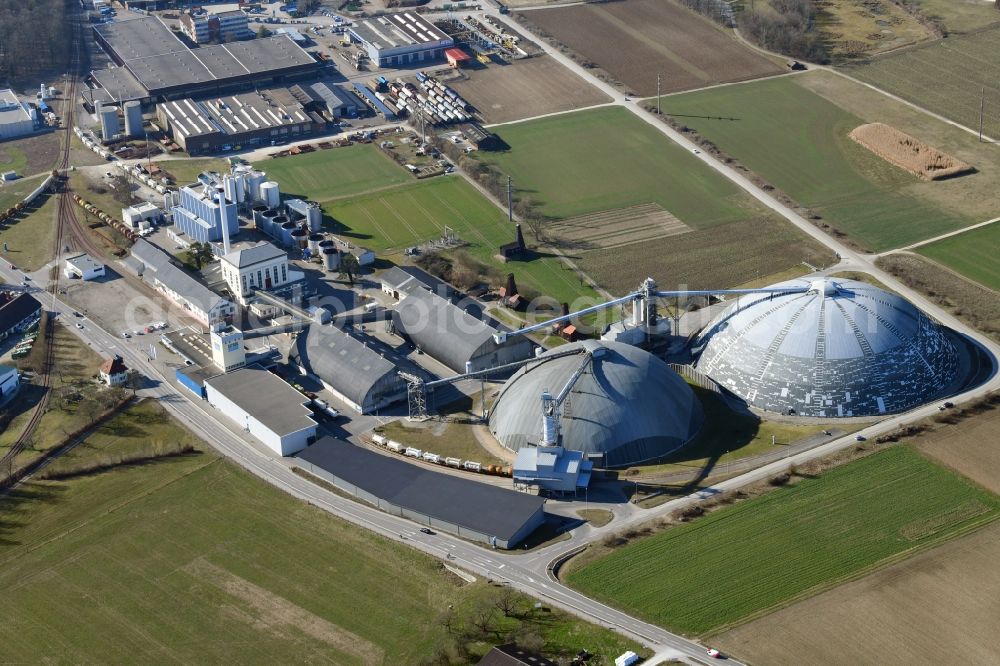 Aerial image Möhlin - The domes and the operating area of the United Swiss Saltworks in Rheinfelden in Switzerland. The domes are built as a wooden structure and the larger is the largest domed structure in Europe. The circular arenas serve as a salt deposit for de-icing salt for winter maintenance. Built from wood technology company Haering