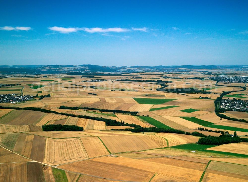 Pillig from the bird's eye view: The landscape and fields around Pillig in the state of Rhineland-Palatinate. The whole region is characterised by agricultural areas and fields. Pillig is surrounded by the two rivers Wallebach and Elzbach. View from Pillig to the North