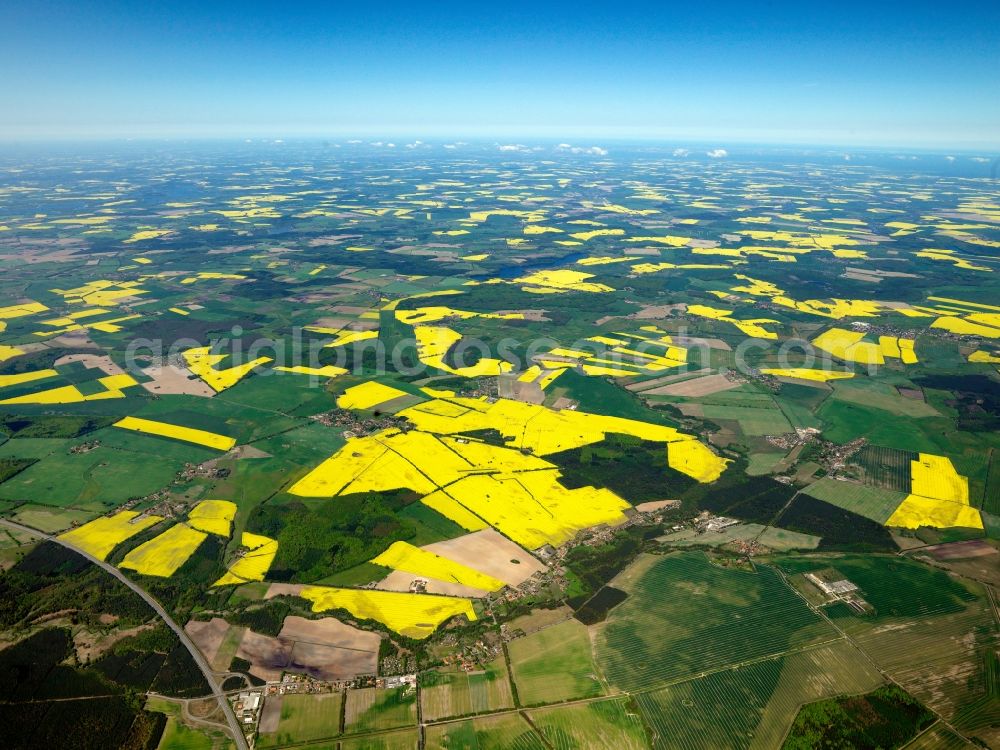 Rastow from the bird's eye view: The landscape of the borough of Rastow in the district of Ludwigslust-Parchim in the state of Mecklenburg-Vorpommern. Rastow is located on the edge of the preserve area of Lewitz. The landscape is characterised by agriculture and rapeseed fields