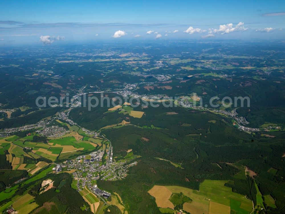 Aerial image Lennestadt - The surrounding landscape of Lennestadt in the Sauerland region of the state of North Rhine-Westphalia. Lennestadt is located in the district of Olpe and consists of 43 parts. It is especially important as a recreational area and as a tourist destination