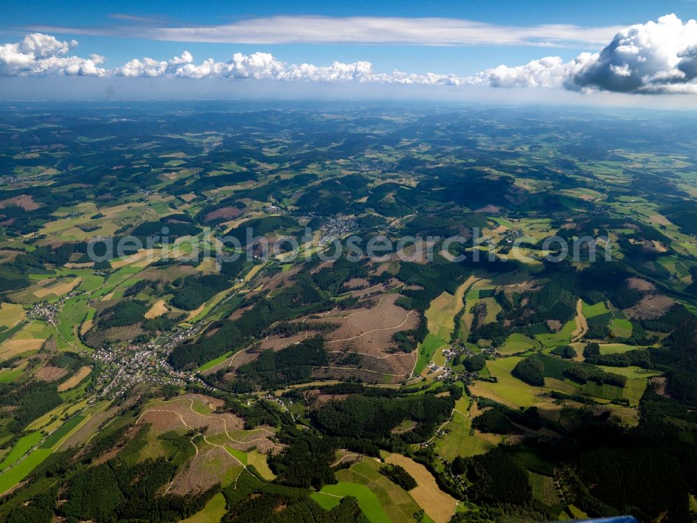 Aerial photograph Lennestadt - The surrounding landscape of Lennestadt in the Sauerland region of the state of North Rhine-Westphalia. Lennestadt is located in the district of Olpe and consists of 43 parts. It is especially important as a recreational area and as a tourist destination