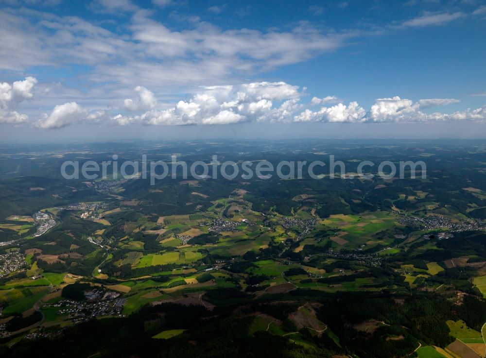 Lennestadt from above - The surrounding landscape of Lennestadt in the Sauerland region of the state of North Rhine-Westphalia. Lennestadt is located in the district of Olpe and consists of 43 parts. It is especially important as a recreational area and as a tourist destination