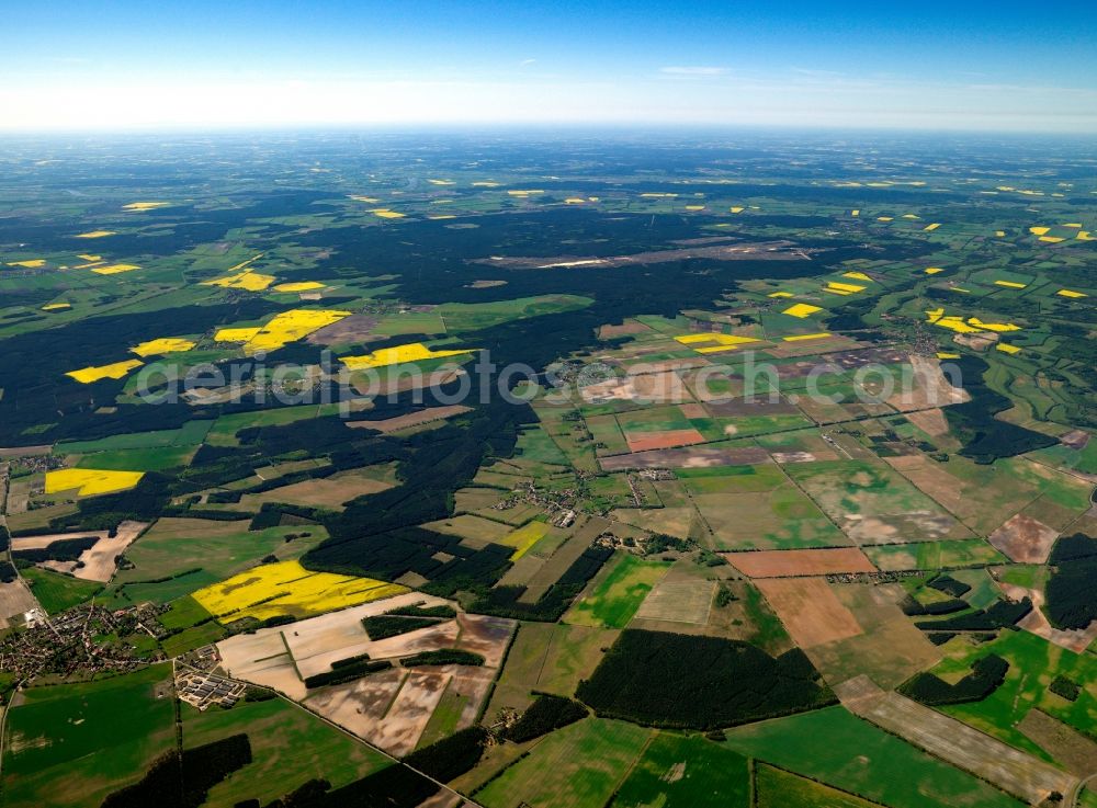 Aerial image Schwerin - The landscape south of Schwerin in the county district of Ludwigslust-Parchim in the state of Mecklenburg-Vorpommern. The surroundings are characterised by agriculture and small villages. Especially distinct is the yellow colour of the rapeseed and canola fields of the region