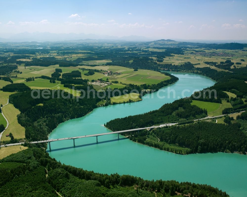 Schongau from above - The Lech Valley Bridge and its surroundings in Schongau in the state of Bavaria. The bridge connects Schongau on the west shore of the river and Peiting on the East side. The building runs across the Lech barrier lake. The bridge accommodates the federal highways 17 and 472