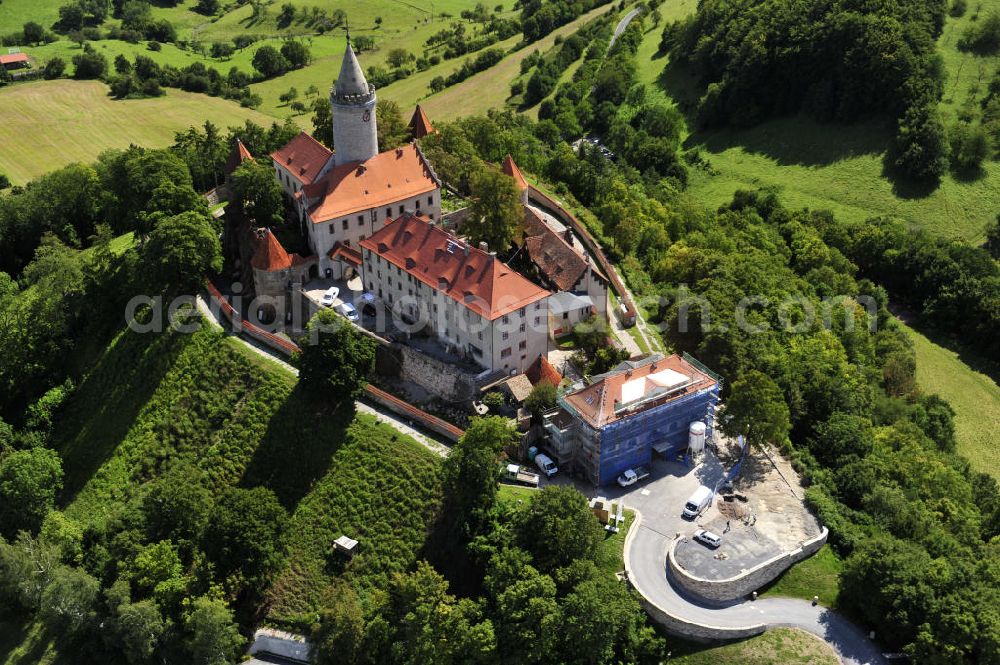 Seitenroda from the bird's eye view: Die Burg Leuchtenburg in Seitenroda bei Kahla im Thüringer Wald, Thüringen. Sie gilt als die Königin des Saaletals und liegt auf einem weithin sichtbaren Bergkegel auf einer Höhe von fast 400 Metern. Die Burg gehört der Stiftung Leuchtenburg. The castle Leuchtenburg in Seitenroda in the Thuringian Forest. It is considered as the Queen of the Saale valley and situated on large conical mountain peak at an altitude of almost 400 meters. It belongs to the foundation Leuchtenburg.