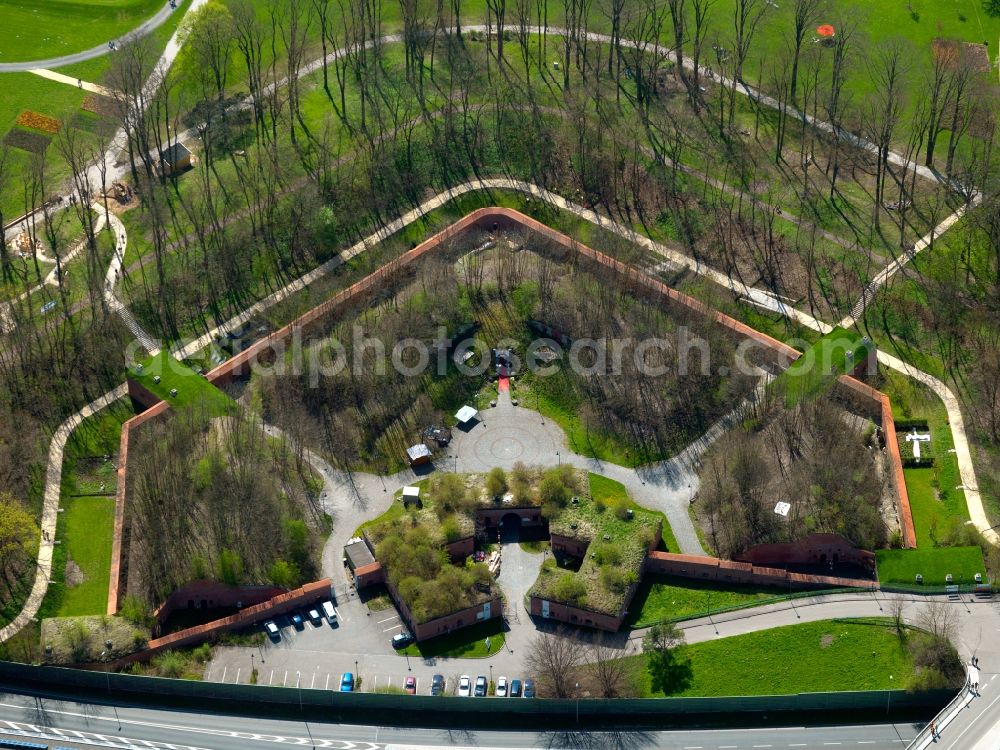 Aerial photograph Neu-Ulm - The fortress Ludwigsvorfeste of the Fortress of Ulm on Europastraße in Neu-Ulm in the state of Bavaria. The ruins are part of a park and used as a restaurant. The Fortress is one of five federal fortresses and Europe`s largest fortress. It was built in the 19th century around the cities of Ulm and Neu-Ulm and consists of several forts, towers, fortresses and defense facilities