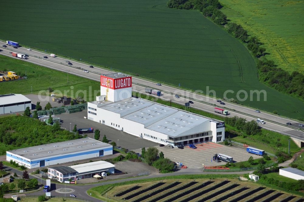 Aerial photograph Lützen - The Lugato facility in the commercial park in the Zorbau part of Lützen in the state of Saxony-Anhalt. The industrial building is not used by the company anymore but it is a landmark for the commercial area