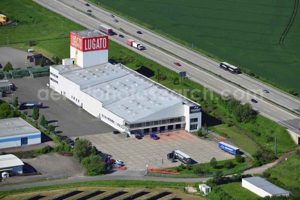 Lützen from above - The Lugato facility in the commercial park in the Zorbau part of Lützen in the state of Saxony-Anhalt. The industrial building is not used by the company anymore but it is a landmark for the commercial area