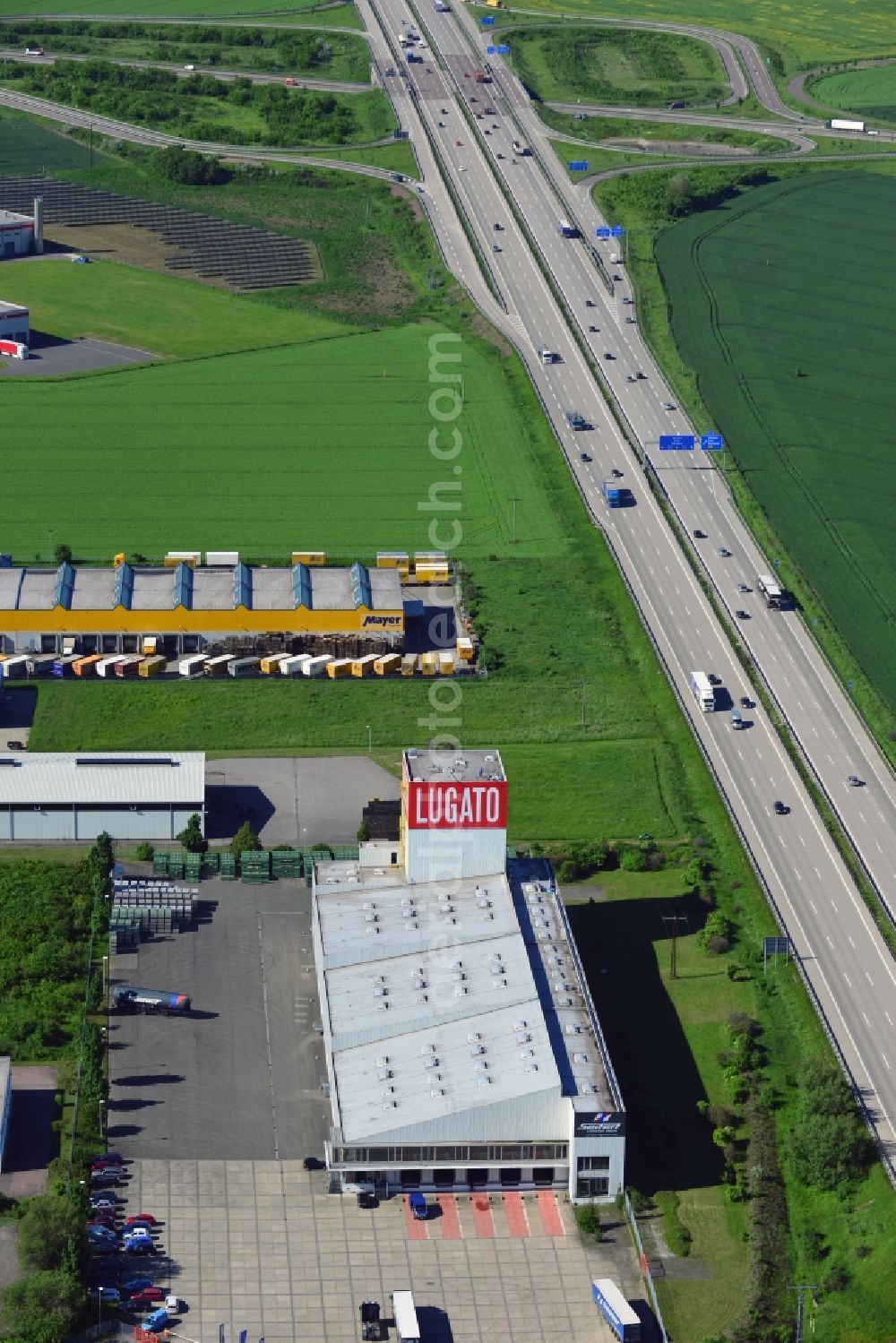 Aerial image Lützen - The Lugato facility in the commercial park in the Zorbau part of Lützen in the state of Saxony-Anhalt. The industrial building is not used by the company anymore but it is a landmark for the commercial area