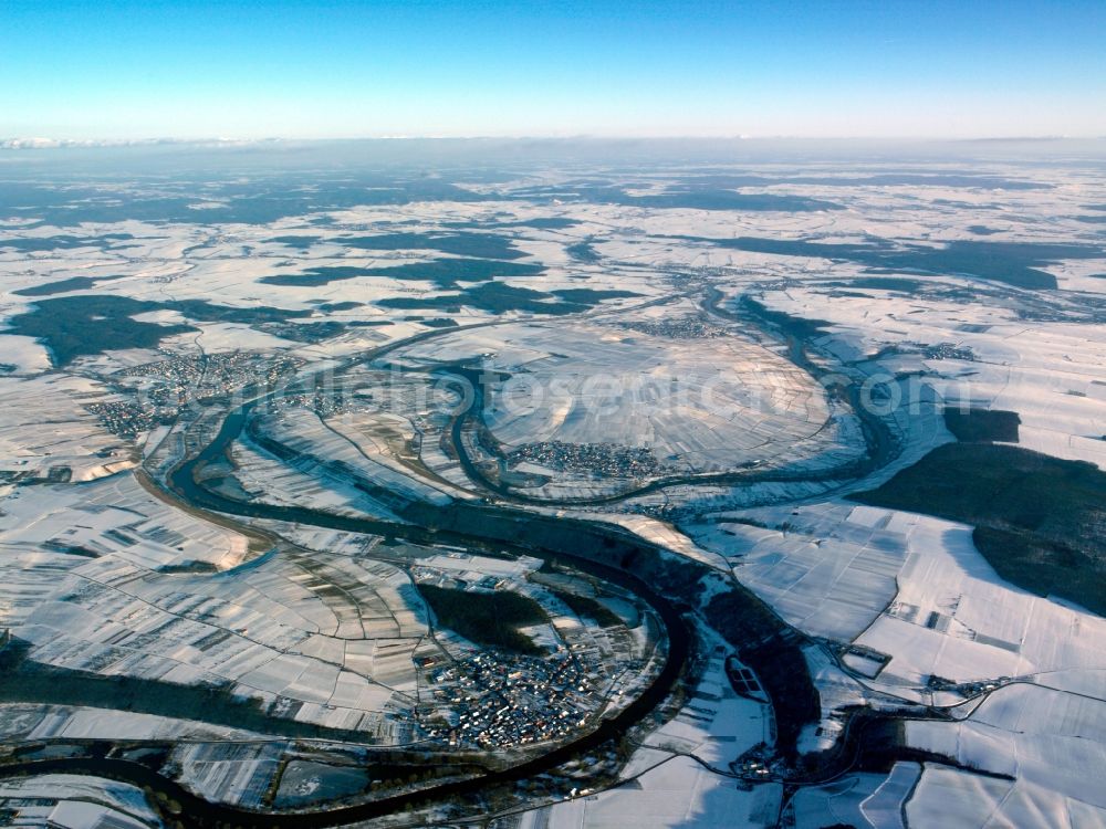 Volkach from above - The run of the river Main at Volkach in the Lower Franconia region of the state of Bavaria. The city is located on the river Main in the main-franconian winery region. The river forms a horseshoebend outside Volkach and runs through the snow covered winter-landscape