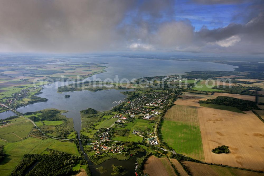 Aerial photograph Rechlin - Blick über die Müritz in der Mecklenburgischen Seenplatte nach Norden. Die Müritz ist zweitgrößte Binnensee Deutschlands und der größte, der komplett innerhalb Deutschlands liegt. View over the Mueritz in the Mecklenburg Lake District to the north. It is second largest lake in Germany and the largest, which lies entirely within Germany.