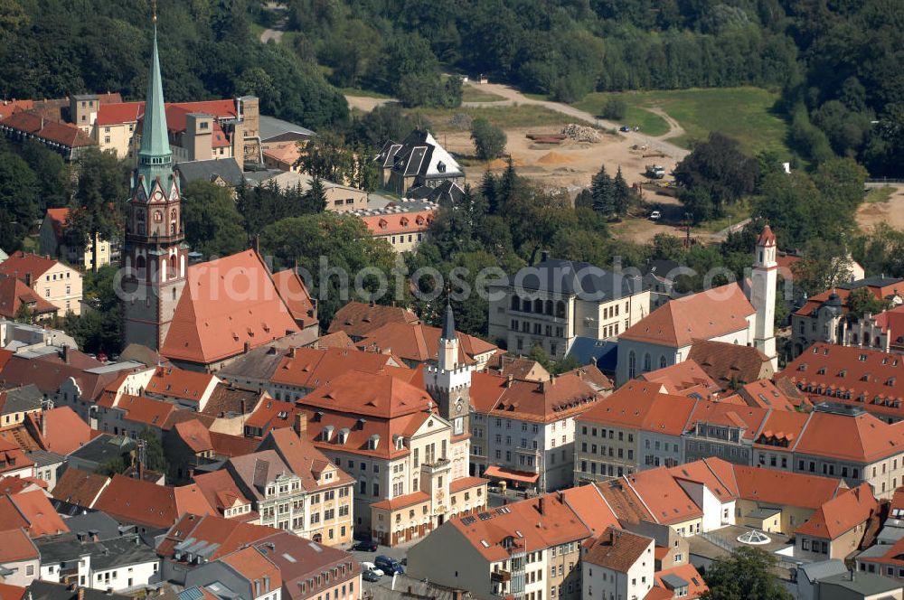 Aerial image Löbau - Blick auf die St.-Nikolai-Kirche. Erbaut wurde die Kirche im 13. Jahrhundert, der gotische Stil stammt von einem Umbau. Zwischen 1739 und 1742 wurde die Kirche vergrößert und der Südturm angebaut. Kontakt: Ev.-Luth. St.-Nikolai-Kirchgemeinde Löbau , Johannisplatz 1/3, 02708 Löbau, Tel. 03585 4704 0, Pfarrer F. Krohn,