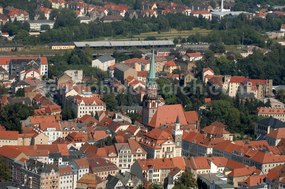 Aerial photograph Löbau - Blick auf die St.-Nikolai-Kirche. Erbaut wurde die Kirche im 13. Jahrhundert, der gotische Stil stammt von einem Umbau. Zwischen 1739 und 1742 wurde die Kirche vergrößert und der Südturm angebaut. Kontakt: Ev.-Luth. St.-Nikolai-Kirchgemeinde Löbau , Johannisplatz 1/3, 02708 Löbau, Tel. 03585 4704 0, Pfarrer F. Krohn,