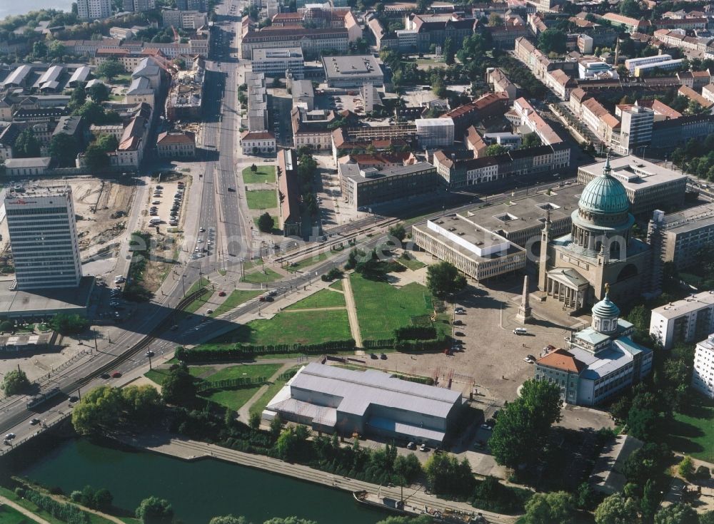 Potsdam from the bird's eye view: St. Nicholas Church (right) at the Old Market in Potsdam in Brandenburg. To the left is the Fachhochschule Potsdam. Right in front of the church is the Knobelsdorf house. In the foreground sthet the temporary structure of the Hans Otto Theatre, also popularly known as the tin. In the picture on the left is the Hotel Mercure. In the background houses