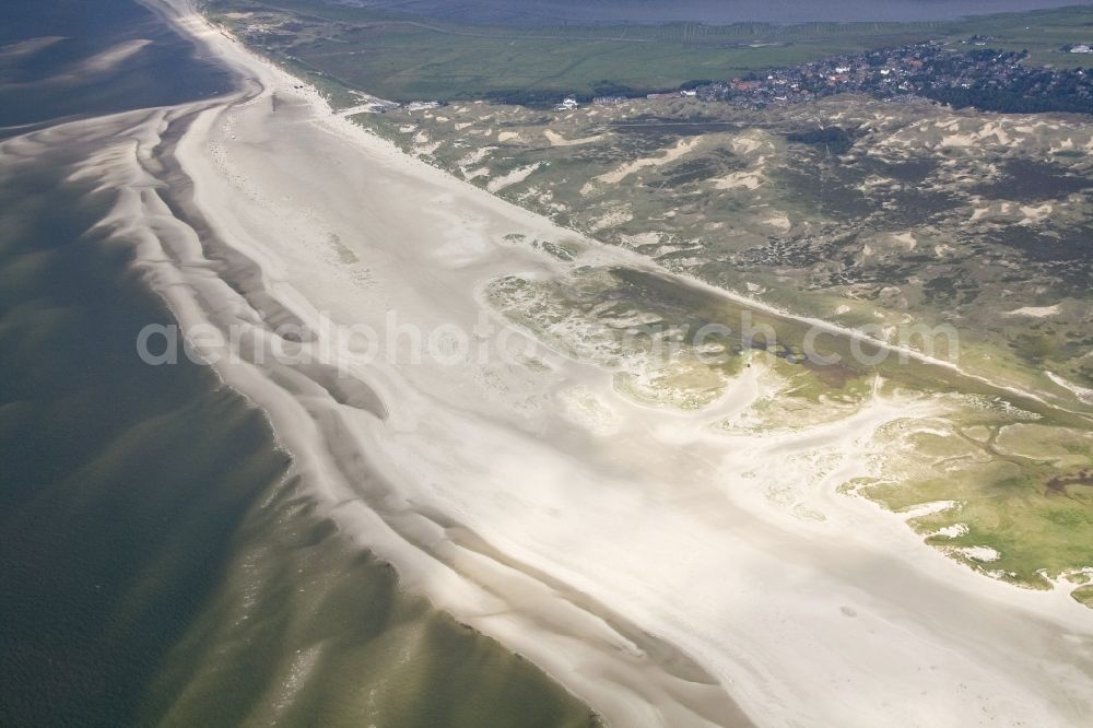 Aerial image Amrum - Amrum is beside the North Frisian island of Sylt and Fohr to the three core Geest islands. On the ridge of which have extensive forests and heathlands that form essentially a strip in the north-south direction. West of this strip is located along the entire length of the island's dunes. Because of extensive protected areas are the only Amrumer dunes of the west coast that are of gulls and ducks used to breed