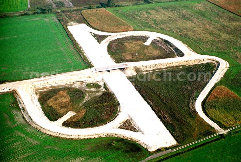 Aerial photograph Trebbin / Brandenburg - Mit den Bauarbeiten an der Umfahrung soll nun im April 2004 begonnen werden. Der Termin für die Fertigstellung dieses Abschnitts ist auf Mitte 2006 verschoben. Markt 1 - 3, 14959 Trebbin, Telefon: +49 33731 / 8420,Telefax: +49 33731 / 230911, Achim Walder: